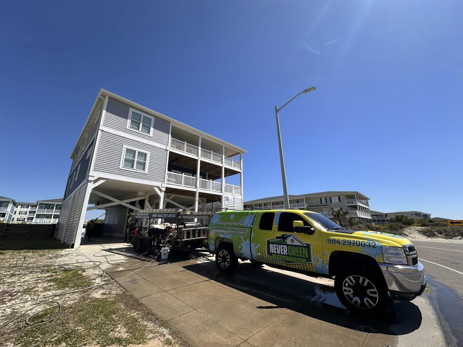 Pressure washing a beach house