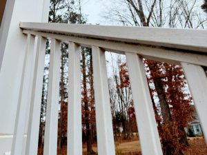 Dirty hand railing on deck