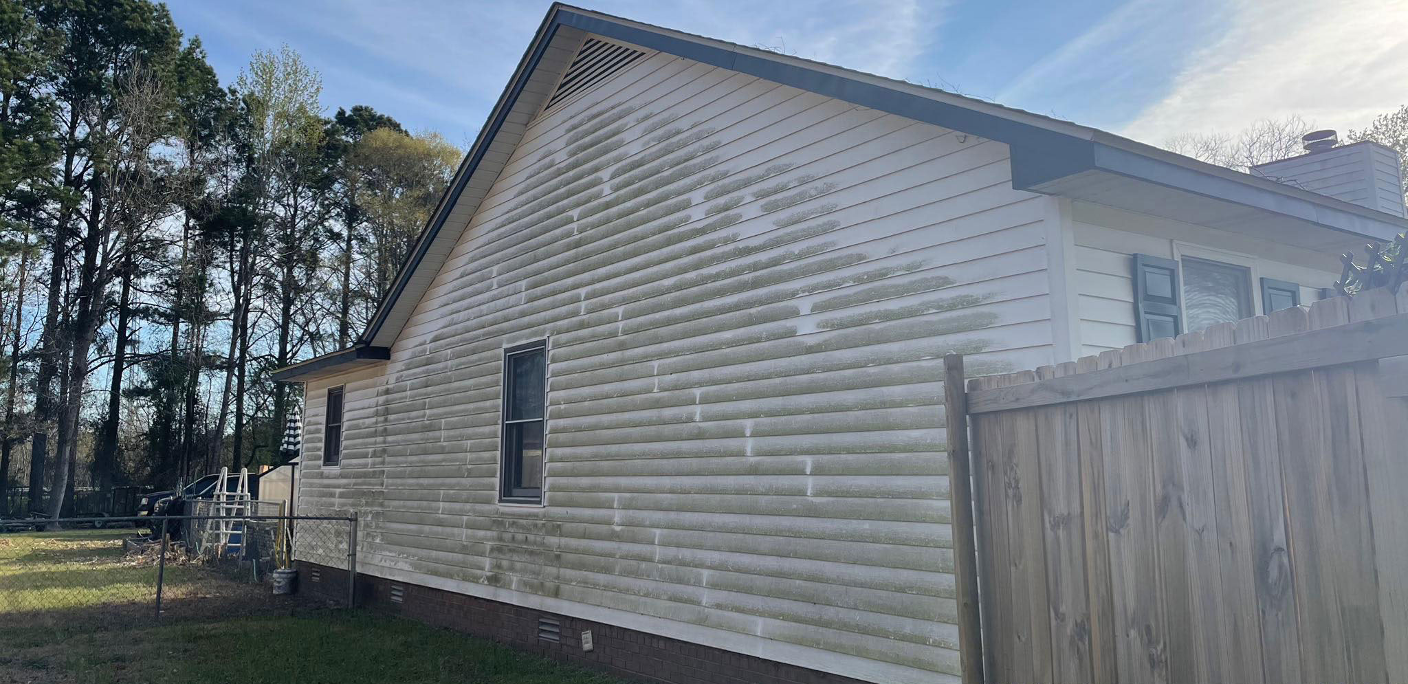 Before pressure washing a home in Clayton