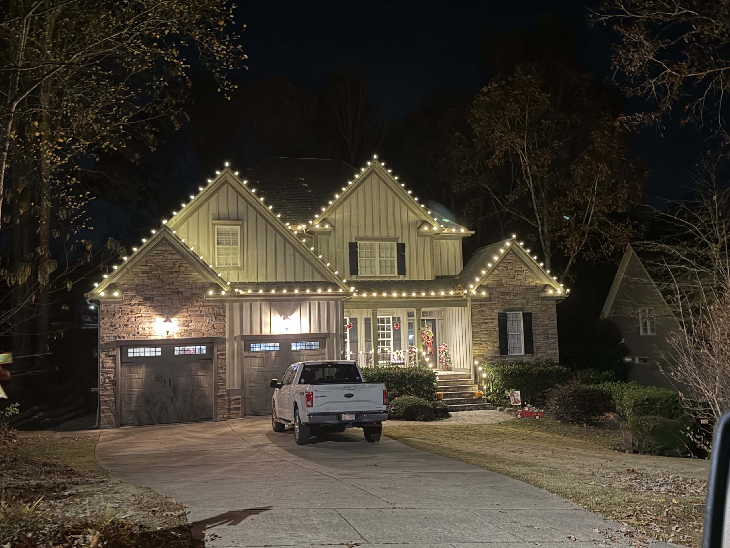 White holiday lights on house